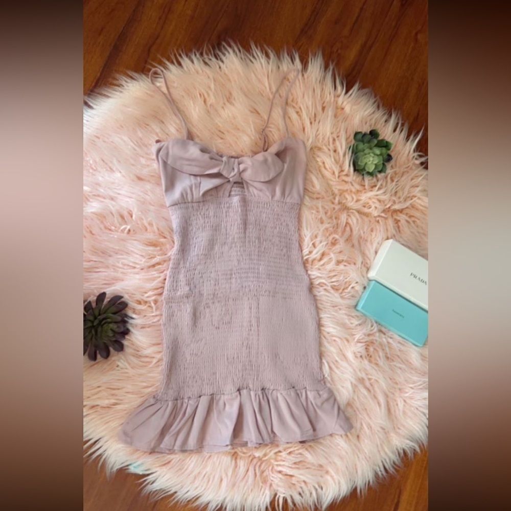 short strappy dress with bow detail on the chest, new